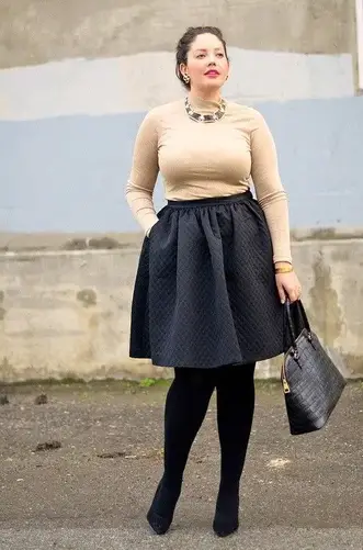 lady wearing leggings under a skirt