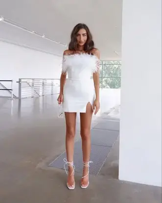 lady wearing LWD with strap heels