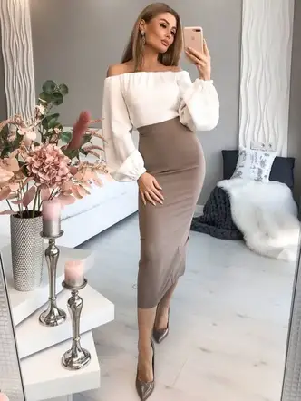 lady wearing top and long pencil skirt