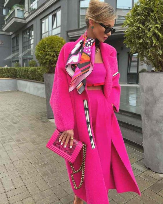 Woman wearing stylish pink clothes