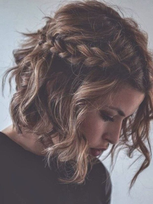 Woman with short braided hair and waves