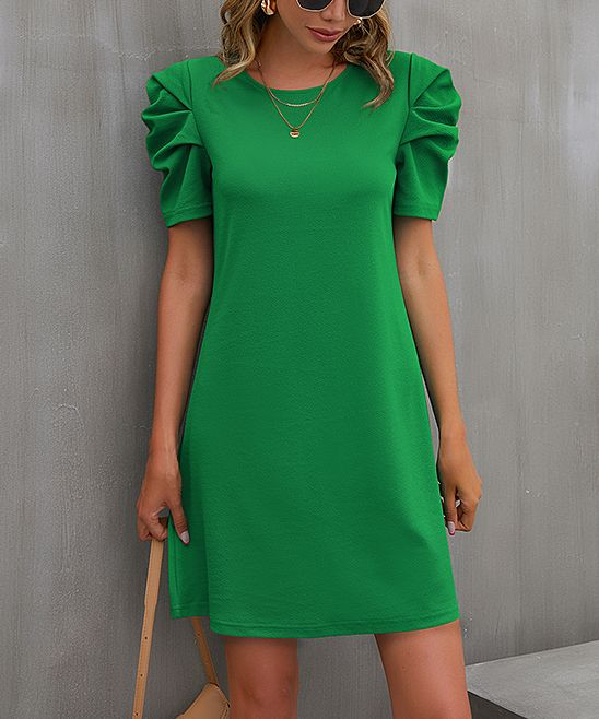 woman in green short dress