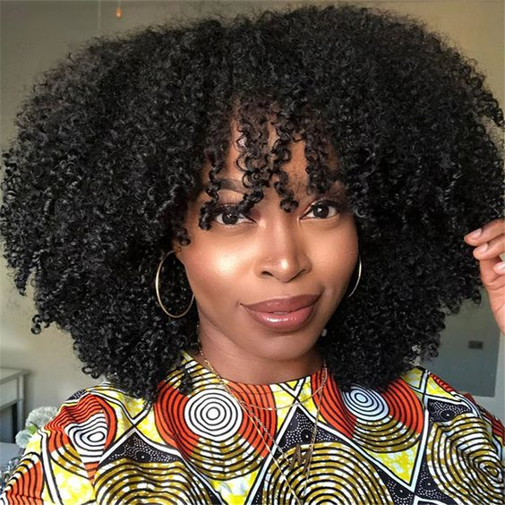Woman wearing afro kinky curly hair