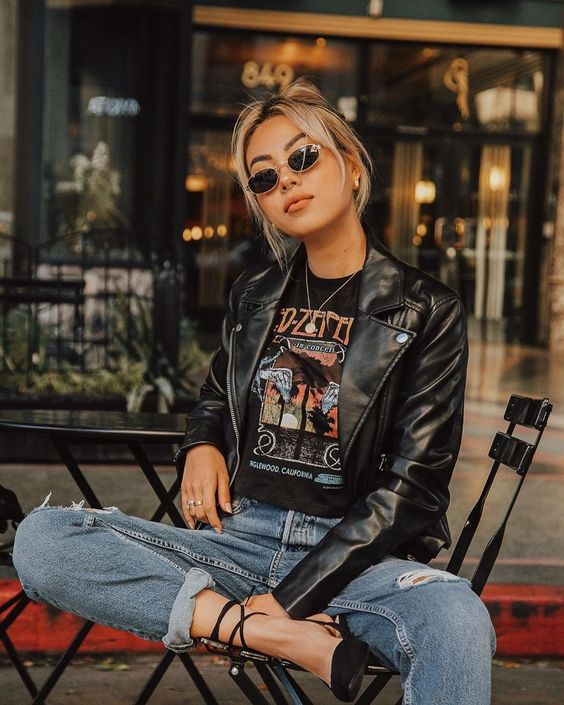 Woman wearing leather jacket and chic fashion style