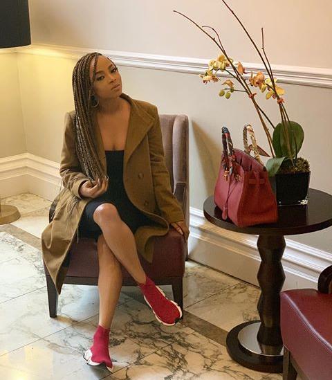 red sneakers as styled by Toke Makinwa