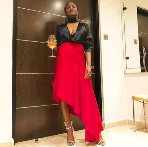 lady on black and red color outfit