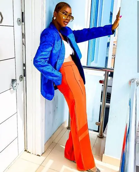 lady rocking blue and orange color outfit