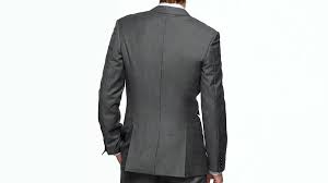 grey suit with double vents